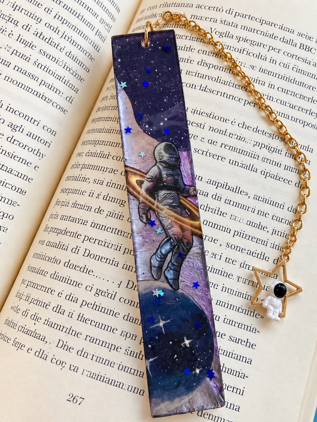 Segnalibro Galassia con astronauta, stelle e catenella dorata con ciondolo a stella